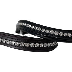 Produits équestres de haute qualité faits à la main, ménottes de tête pour cheval en cuir véritable rembourrées avec une rangée de cristaux transparents brillants. - Product Image 5