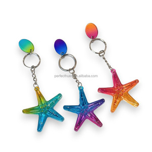 Llavero de recuerdo de estrella de mar de colores llamativos que brilla en la oscuridad, artículos de tienda de regalos - Product Image 1