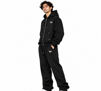 Ensemble de survêtement sportif oversize noir pour homme, avec sweat à capuche zippé à poches et clous décoratifs, en coton épais, personnalisable, vente en gros