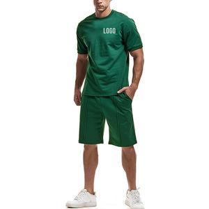 Conjunto de 2 Piezas para Hombre, 100% Algodón, Estilo Casual de Verano, Camiseta de Cuello Redondo y Manga Corta, Pantalones Cortos Deportivos de Corte Clásico - Product Image 1