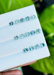 พลอยเพทายสีฟ้าธรรมชาติทรงรี รับรองโดย IGI น้ำหนักรวมเบา สำหรับทำเครื่องประดับ แหวน จี้ ต่างหู - Product Image 3