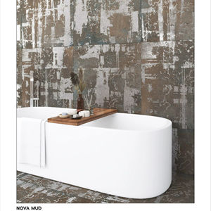 Carreaux de porcelaine texturés mats 60x60 cm, développés pour créer des intérieurs sereins, avec une surface à profondeur de couche variée et une durabilité fiable du revêtement. - Product Image 1