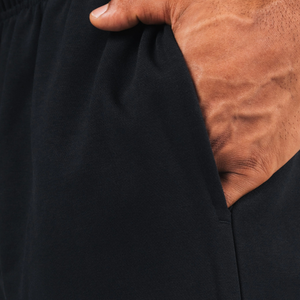 Pantalon de jogging unisexe noir en molleton épais, mélange de coton, avec revers élastiques, personnalisable avec logo OEM, pour commande en gros - Product Image 5