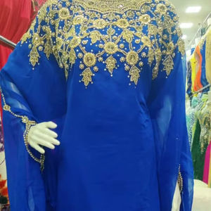 Kaftan Royal Azure orné à la main : Une robe en mousseline de soie bleue exquise avec des broderies Zari dorées complexes et un tombé éthéré - Product Image 1