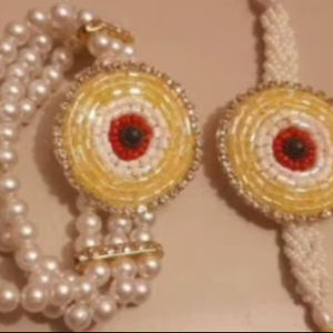 Exquisito Set de Rakhi Bhaiya Bhabhi con Ojo Turco, Amuleto Protector Artesanal de Perlas y Cuentas para Vínculos Eternos, Cadenas de Perlas de Imitación - Product Image 1