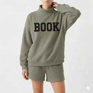 Ensemble haut à col montant et short 100 % coton pour femme, conçu pour une transition facile de la tenue décontractée à la maison à un look élégant en extérieur - Product Image 1