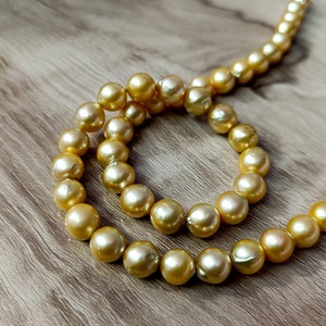 Perlas naturales del Mar del Sur doradas de 8-9 mm, perlas redondas sueltas para la fabricación de joyería a precio de mayoreo. - Product Image 3