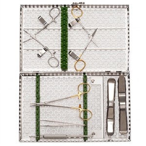 Kit d'implantation post-frénctomie : Ensemble d'instruments chirurgicaux dentaires sélectionnés pour les procédures d'implantation et la chirurgie buccale - Product Image 1