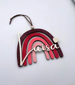 Laser cut wooden rainbow decorative hanging string with engraved baby's name, beautiful basket hanging tag, cute gift in 2024.