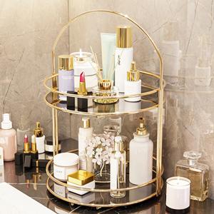 Élégant présentoir cosmétique rond à double couche pour comptoir, finition dorée et poignée de transport - Product Image 4