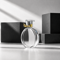 Flacon de parfum de luxe avec couvercle nœud papillon, flacon de parfum rond de 100 ml, flacon de parfum vide, impression de logo sur écran