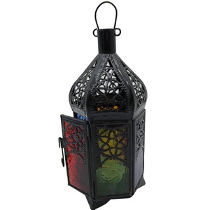 <b>Black</b> Iron <b>Lantern</b> With Colored Glass Panels And Intricate Cutout Design For Home Decoration - Product Image 1