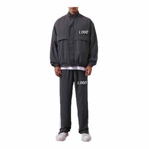 Ensemble de survêtement unisexe gris foncé, veste zippée et pantalon, couleur unie, respirant, en nylon coupe-vent, style décontracté, coupe ample, été, 2 pièces - Product Image 1