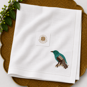 Peacock embroidered napkin, enhances elegance for premium table <b>settings</b>. - Product Image 1