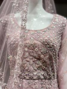 Nouvelle arrivée Lehenga de couleur claire en tissu filet avec Big Flair Fancy Bits et broderie lourde à la main pour les fêtes - Product Image 4