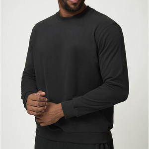 Sweat-shirt à capuche ample en molleton tricoté noir pour homme avec poche, écologique, décontracté, pour le printemps - Product Image 1