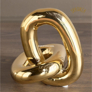 Sculpture Nœud Doré Glamour Moderne, Décoration Artistique Minimaliste Contemporaine Faite à la Main en Aluminium pour Salon Haut de Gamme et Mariage - Product Image 1