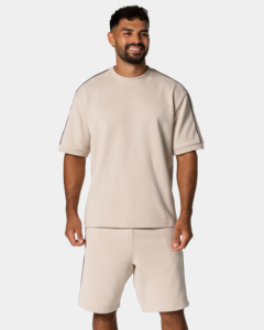 ชุดฤดูร้อนสีพื้นใส่สบายสำหรับผู้ชาย เสื้อยืดผ้าฝ้ายสั่งทำ กางเกงขาสั้นผ้าเจอร์ซีย์ ป้องกันขนร่วง ทรงหลวมไหล่ตก - Product Image 6