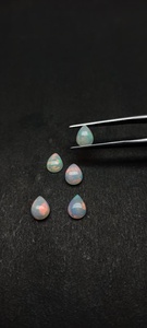 Ópalos Blancos Naturales Etíopes de Alta Luminosidad, Forma de Pera Lisa, Cabujones de 7*9 mm, Oferta al por Mayor a Precio de Mayoreo, Compre Joyería en Línea - Product Image 2