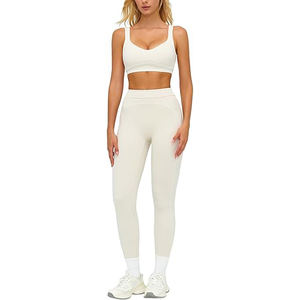 Conjunto de Yoga para Mujer: Leggings Acampanados de Punto Suave y Sujetador Deportivo con Cuello en V Profundo y Laterales Fruncidos, Colección Lifestyle de Nylon y Spandex - Product Image 1