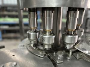 Línea de Llenado y Embotellado de Agua Mineral PET de 200 ml Totalmente Automática con Motor Eléctrico Controlado por PLC de Alta Velocidad y 1 Año de Garantía - Product Image 6