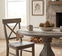Meubles et décoration de maison indonésiens Table ronde en bois de teck recyclé avec pied croisé unique
