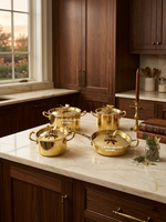 Ensemble de casseroles et poêles de luxe en laiton martelé doré de qualité supérieure avec couvercles décoratifs en forme de papillon, 4 pièces, pour une utilisation professionnelle en cuisine