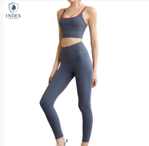 Ensemble de yoga INDEX APPAREL pour femmes, 2 pièces, leggings taille haute, soutien-gorge de sport à dos nageur, couleur unie sans couture - Product Image 1