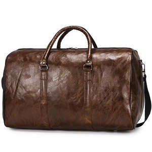 กระเป๋าเดินทางหนังขนาดใหญ่ NESTA SPORTS รุ่น Unisex แฟชั่น สีดำ พร้อมโบว์ตกแต่ง ใช้เป็นกระเป๋าสะพายไหล่หรือถือได้ - Product Image 1