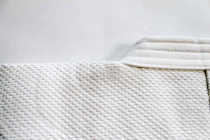 Professional White Karate Gi Set with Premium Quality Material, Reinforced Stitching, and Adjustable Red Belt - Product Image 6