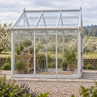 Serre de jardin moderne en aluminium avec toit en verre à pignon et portes françaises pour studio de potager, usage extérieur et parcs