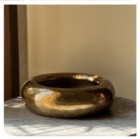 Jardinière de luxe moderne dorée en aluminium moulé, faite à la main, avec revêtement en poudre, en forme de donut, pour la maison, les restaurants et les hôtels, pour bonsaïs et succulentes