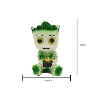 Perfect for home decor office desk decoration Cute handmade resin plant character figurine with green leafy hair playful design - Product Image 4