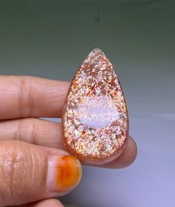 Pierre précieuse naturelle en cabochon de pierre de soleil orange, avec éclat doré et jeu de couleurs, pour bagues, pendentifs et conception de bijoux haut de gamme - Product Image 2