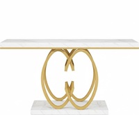 Table console moderne de luxe en acier inoxydable doré avec base sculpturale unique et plateau en marbre blanc pour entrée, hall ou salon