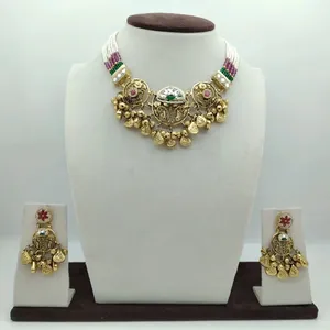 Traditional gold necklace <b>set</b> with intricate temple design <b>beads</b> multicolor accents and matching earrings for festive wedding - Product Image 1