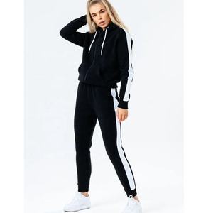 Chándal de mujer de lana de algodón 100% con logotipo personalizado de calidad superior, chándal de dos piezas liso con cremallera para mujer - Product Image 1