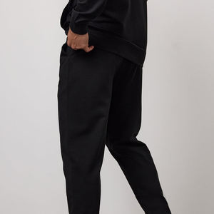 Pantalones Deportivos Unisex de Algodón Negro, Pantalones de Chándal de Color Sólido, Cintura Elástica, Bolsillos Laterales, Ropa Casual de Invierno con Capucha - Product Image 1