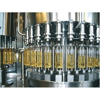 Machine de remplissage et de bouchage automatique de haute qualité pour l'huile comestible, l'huile de coco et l'huile d'arachide, disponible à la vente