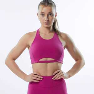 Sujetador deportivo sin costuras para mujer, cuello halter, soporte medio, color rosa liso, ropa deportiva - Product Image 1