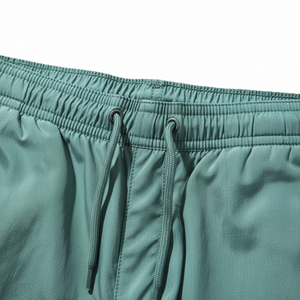 Pantalon de survêtement OEM personnalisé pour homme, en sergé, décontracté, taille mi-haute, coupe-vent, imperméable, 100% polyester/nylon - Product Image 2