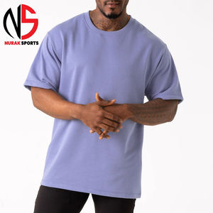 เสื้อยืดโอเวอร์ไซส์ลายกราฟิกสไตล์วินเทจสำหรับผู้ชาย ผ้าฝ้าย 100% เนื้อหนา ไซส์พลัส 230 กรัม ที่ NURAK สินค้าคุณภาพสูง ปี 2026 - Product Image 1