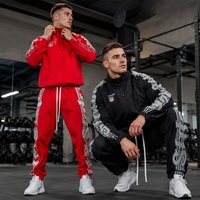Ensemble de survêtement pour homme 100% nylon, logo personnalisé brodé sur le devant, veste et pantalon deux pièces, streetwear d'automne, vente en gros