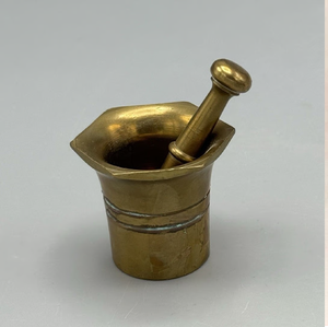 Engraved brass mortar and pestle with side ring handle accents, available at wholesale prices. - Product Image 5