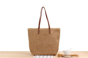 Upgrade your accessory collection with this premium Natural yarn bag designed with a classic open <b>top</b> and slender leather handle - Product Image 5