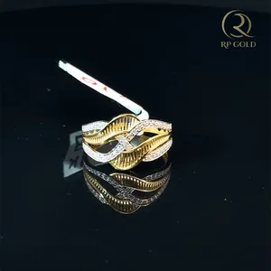 Elegant <b>gold</b> diamond wave <b>ring</b> for women stylish crisscross design luxury jewelry perfect for weddings parties and daily wear - Product Image 1