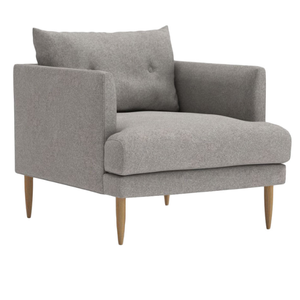 The Kalmar single-arm chair features tapered wooden legs, a button-accented back cushion, and a modern design - Product Image 3