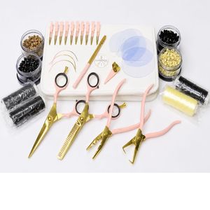 Kit d'outils pour extensions de cheveux rose pâle et or avec pinces, ciseaux, pliers et perles pour usage en salon - Product Image 2