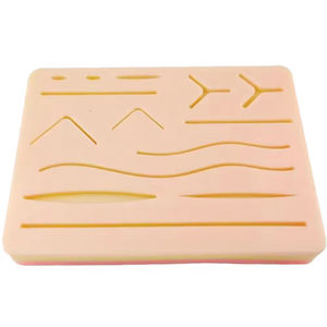 Coussin d'entraînement aux sutures médicales, usage clinique manuel, silicone 3 couches avec divers motifs de points pour étudiants en chirurgie Java - Product Image 3