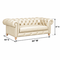 Canapé Chesterfield en cuir véritable ivoire avec dossier capitonné et accoudoirs roulés, trois places, pour salon